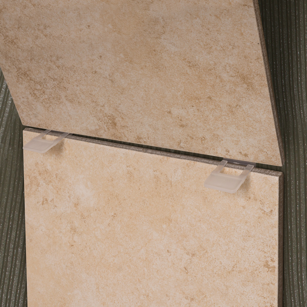 Anclas planas para sistema de nivelación de losetas hasta 1.5mm (bolsa de 100 unidades)